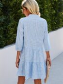 Delphine - Robe à col en V avec motif rayé et patte de boutonnage