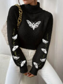 Alma - Pull à col roulé avec motif papillon